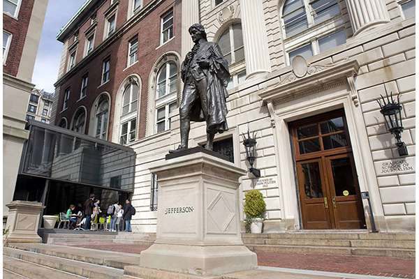 A statue of Thomas Jefferson stands at the front of the Columbia Journalism School