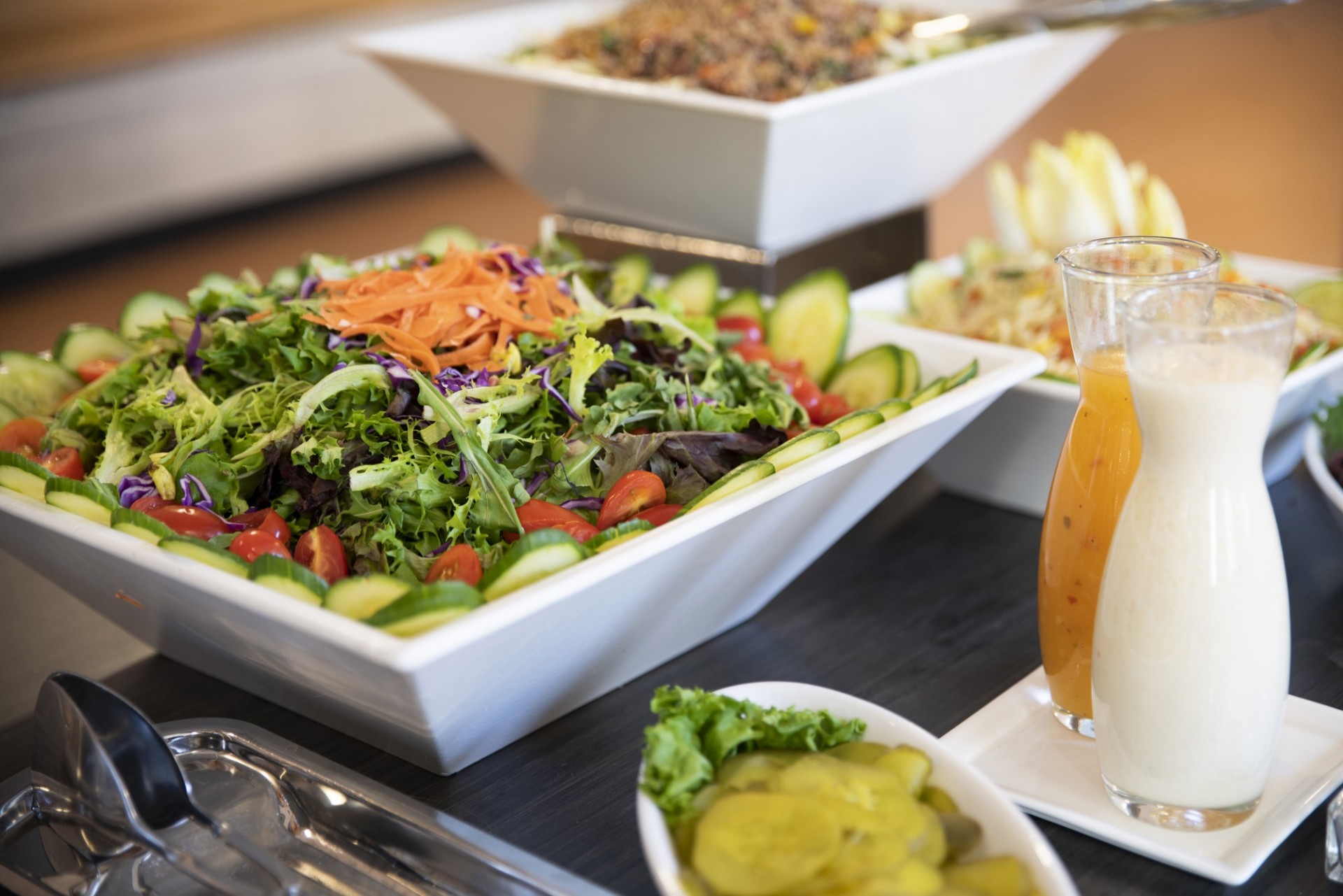 Garden salad with a selection of dressings