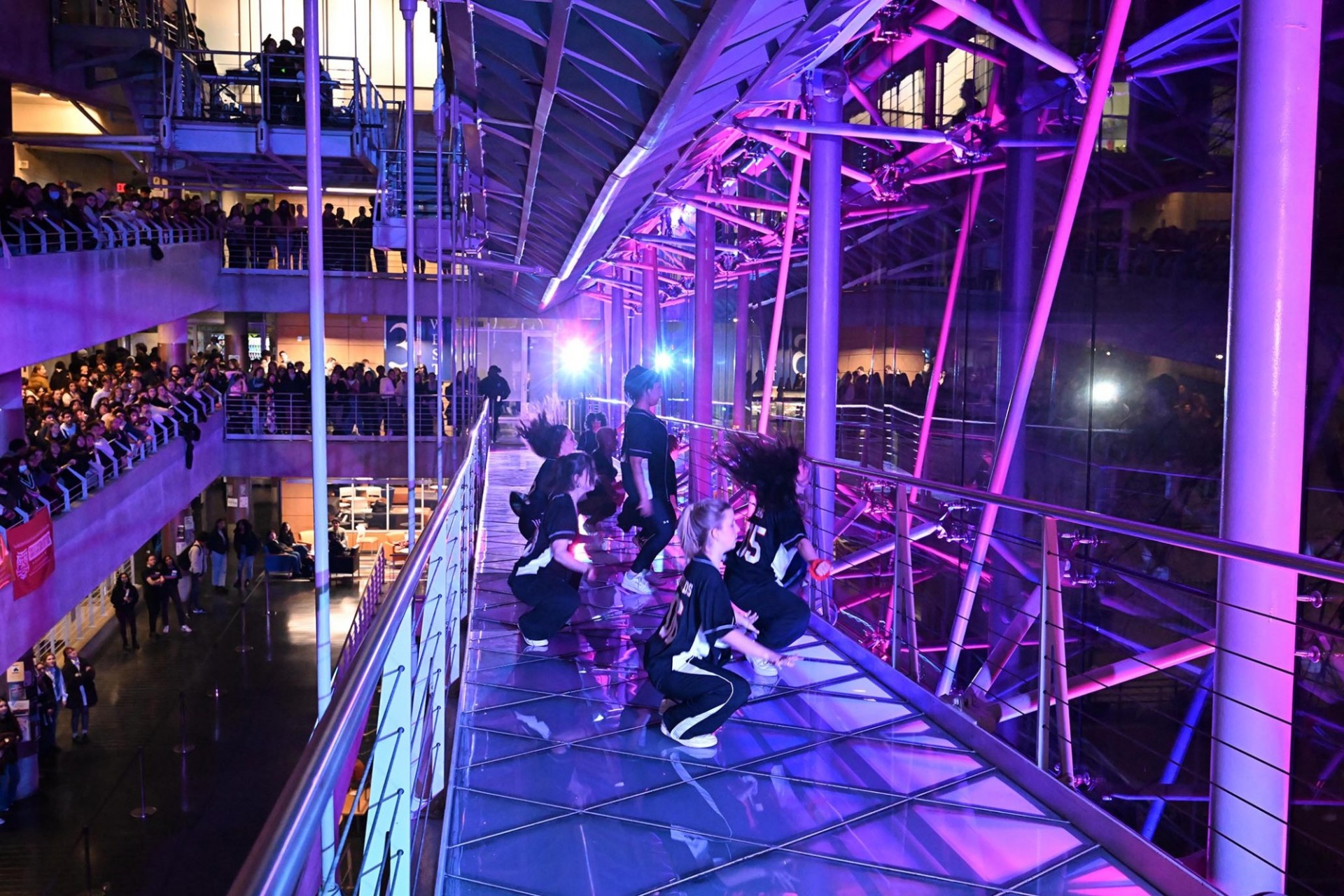 Students dancing on a floor of Lerner Hall during Glass House Rocks.