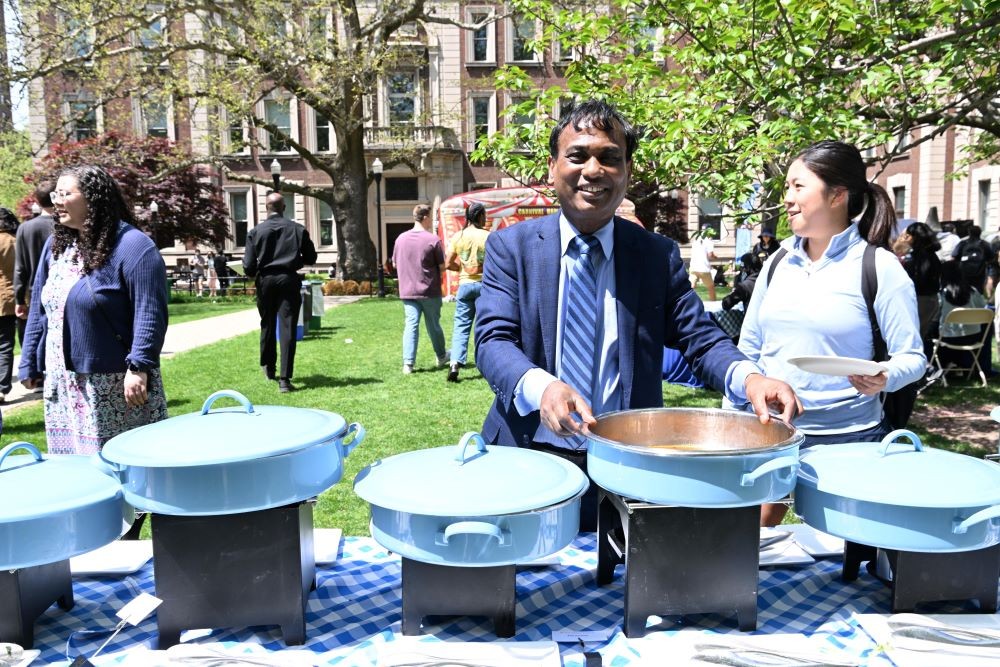 a University Event Management staff member at the buffet