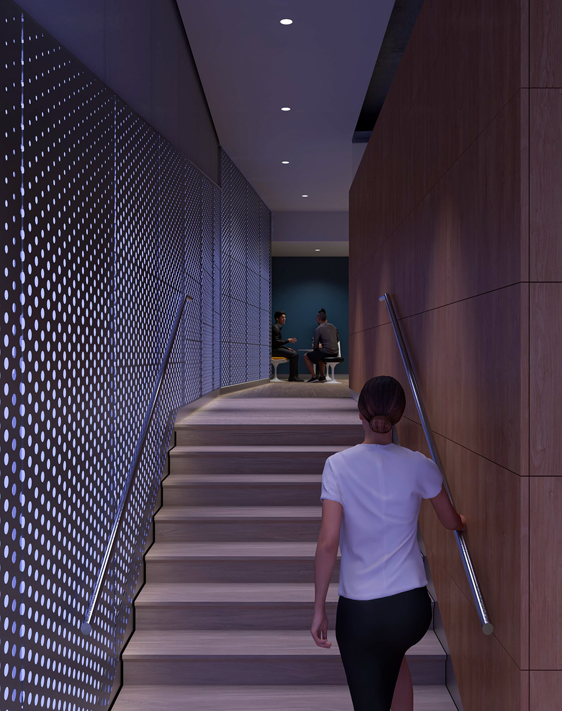 A student uses the new staircase from the lower level to the entrance
