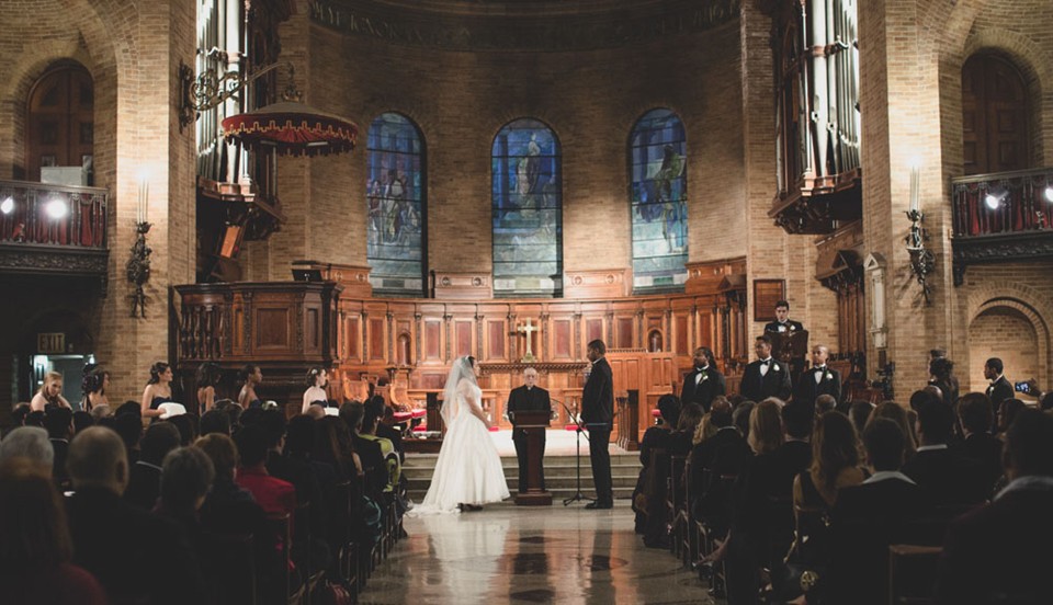 A photo of a wedding at Saint Paul's Chapel.