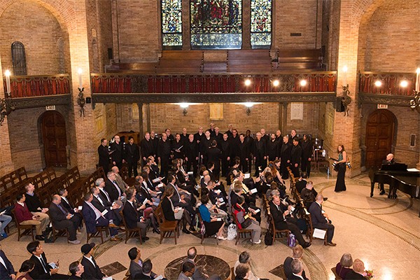 People are seated for an event in St. Paul's Chapel