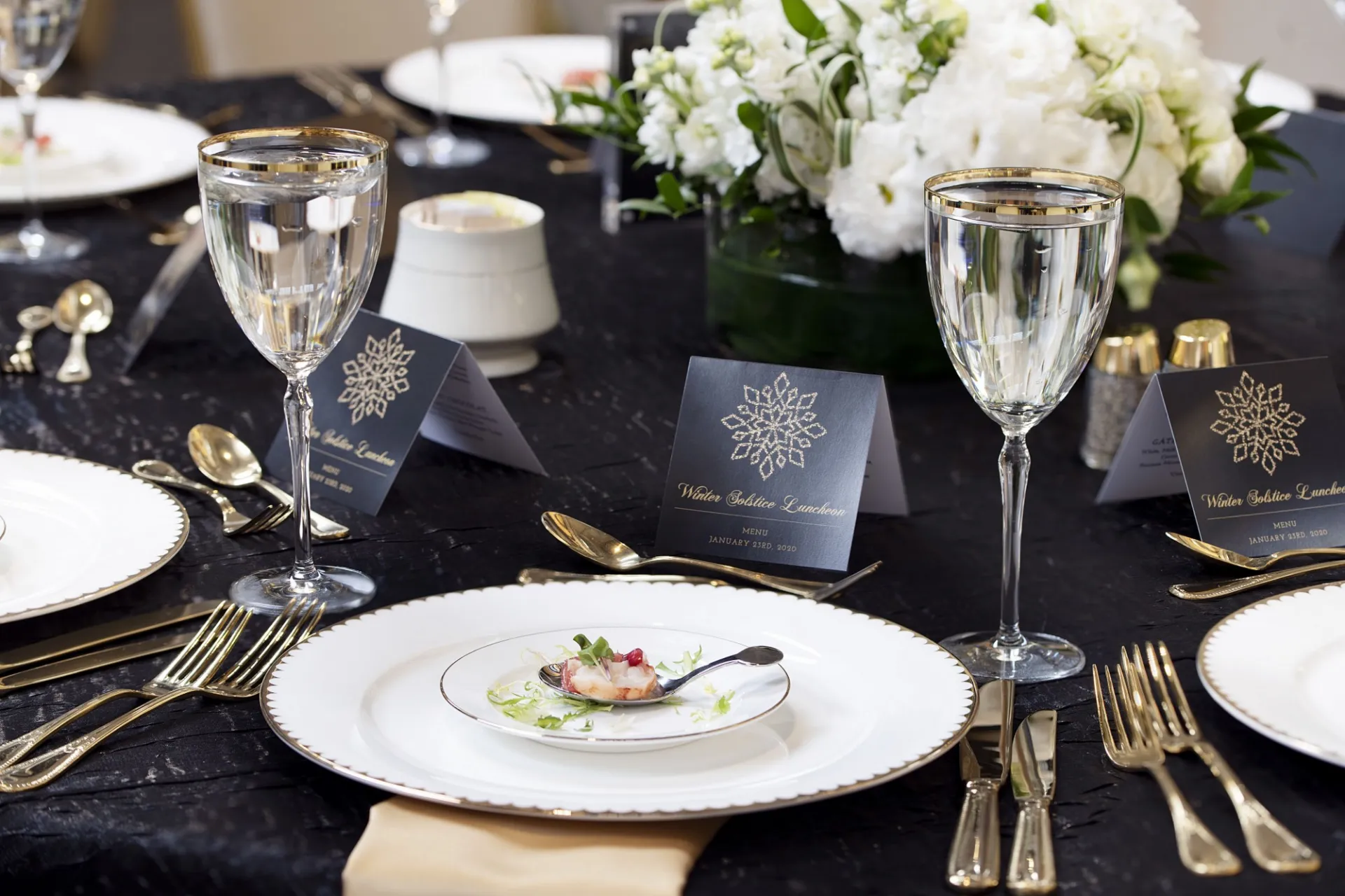 An amuse bouche made with lobster sits on a plate at the Winter Solstice event
