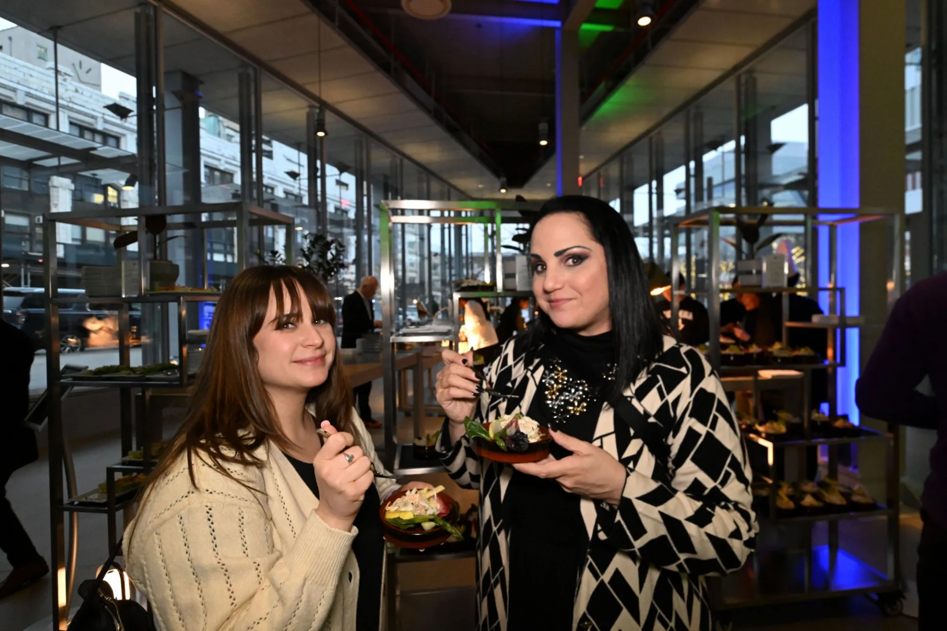 Guests enjoying the event in the Atrium