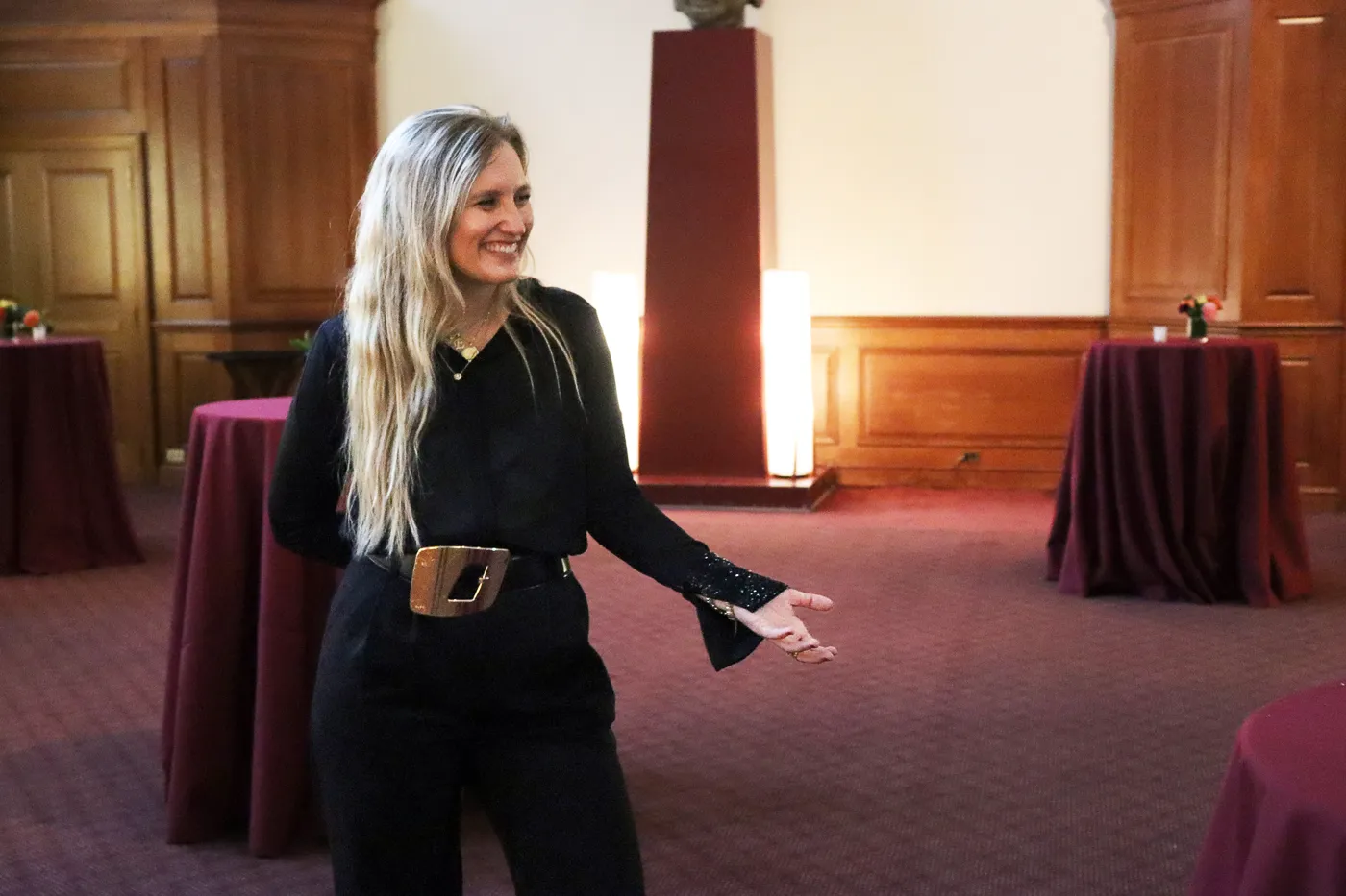 Emily Ailts welcoming guests at an event in Low Library